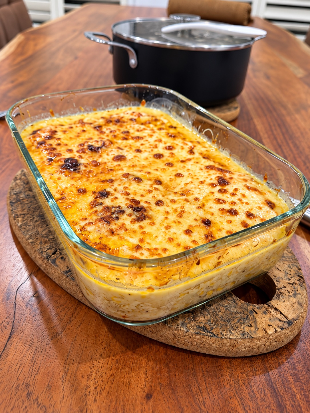 Boufarhat chicken and corn gratin with a golden browned cheese topping.