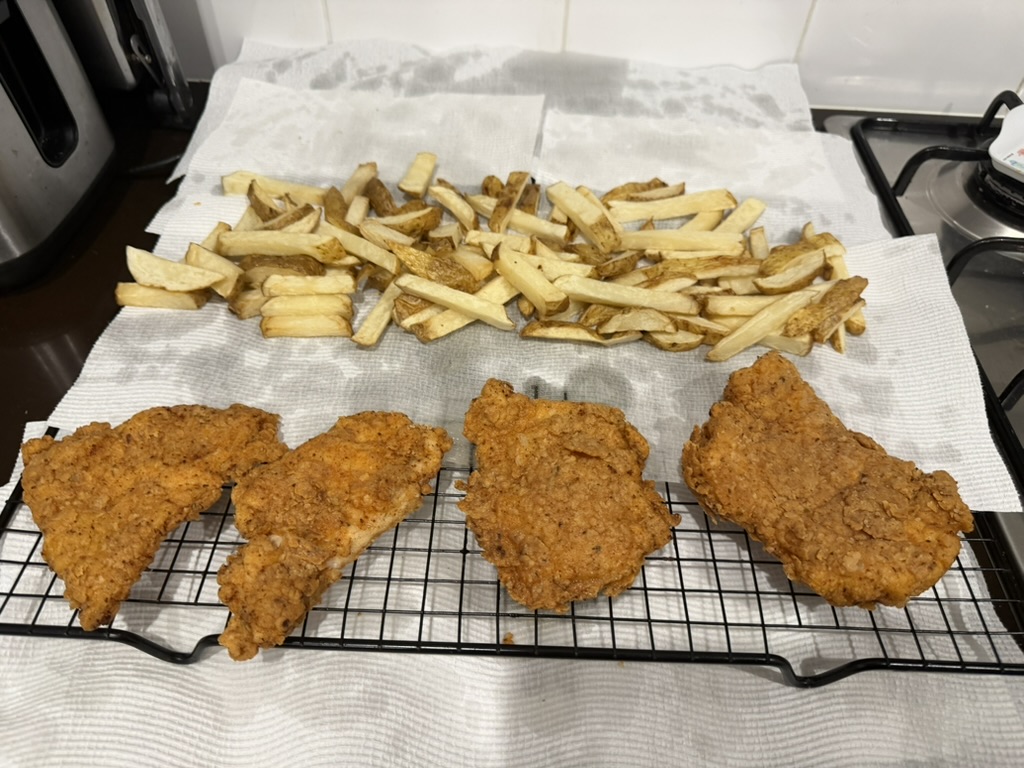 Chicken burger assembly and the finished meal.
